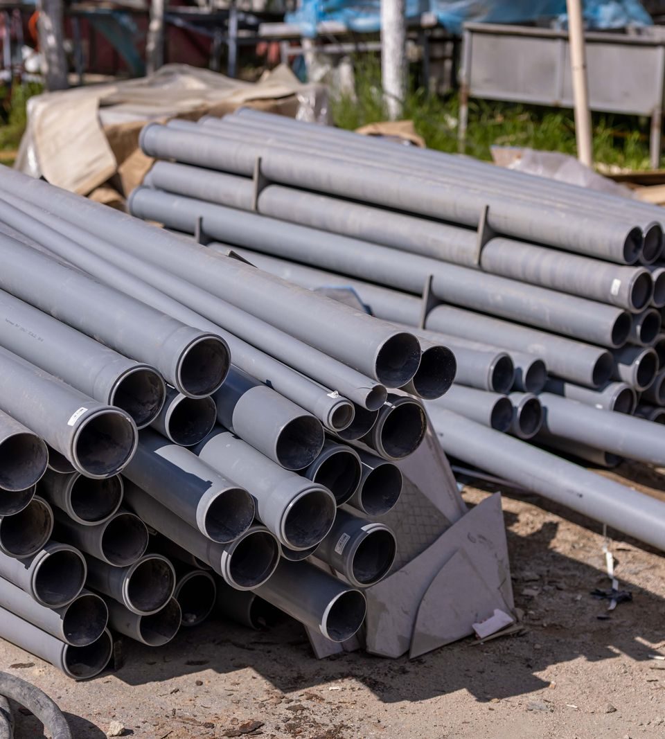 Stack of PVC pipe ready for a septic line repair